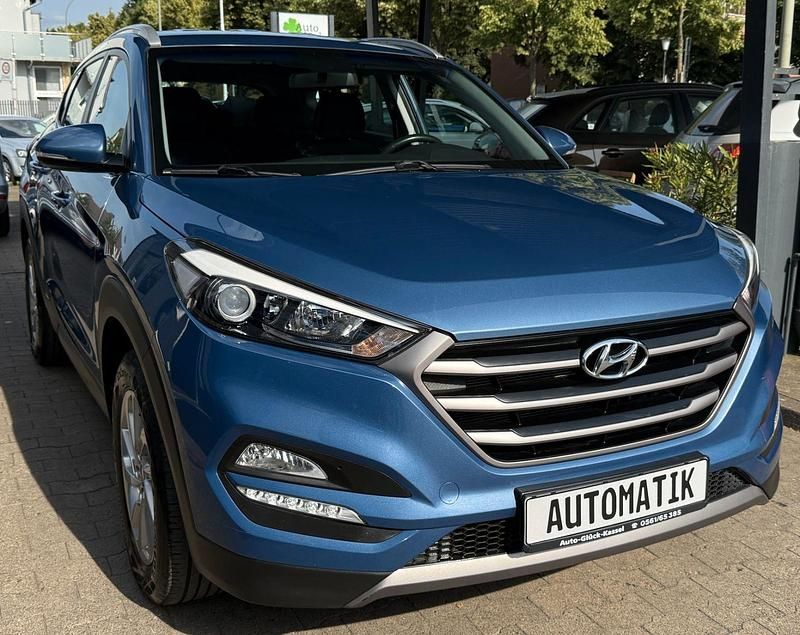 Blau Gebraucht 2016 Hyundai Tucson SUV | 14.990 € (Fairer Preis) - Bild 1/4