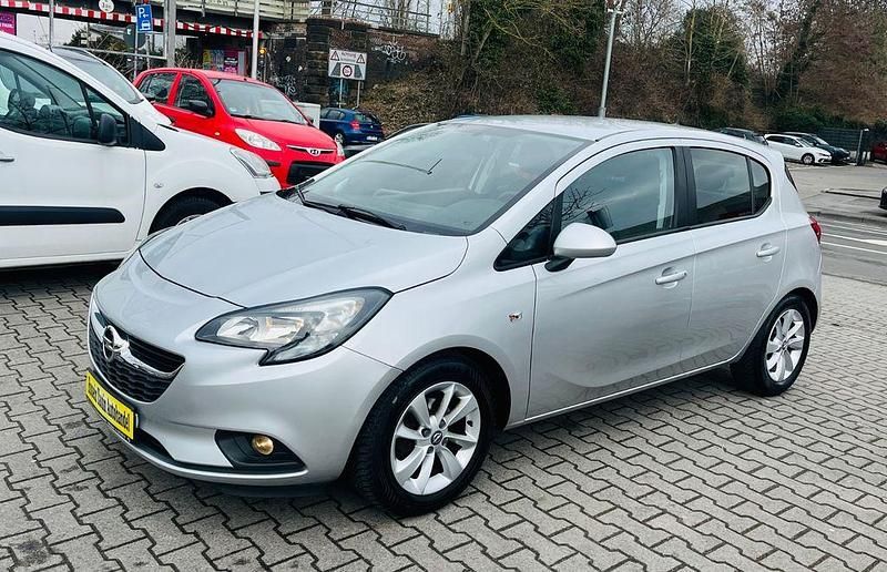 Gebraucht Opel Corsa drive 90 PS (66 kW) 2015 Silber Kleinwagen