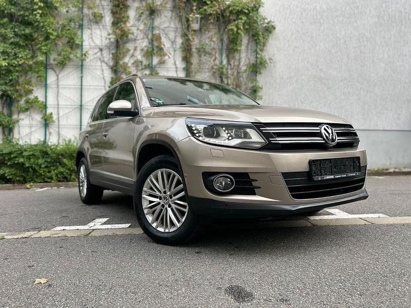 Beige Gebraucht 2015 VW Tiguan Sportline SUV | 9.999 € (Superpreis) - Bild 1/4