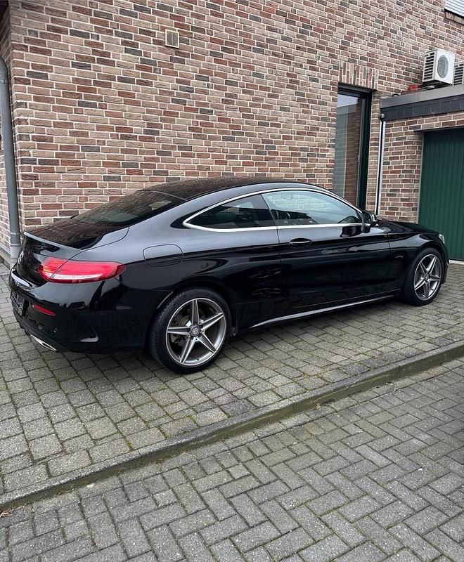 Gebraucht Mercedes C180 AMG 156 PS (114 kW) 2016 Schwarz Coupé