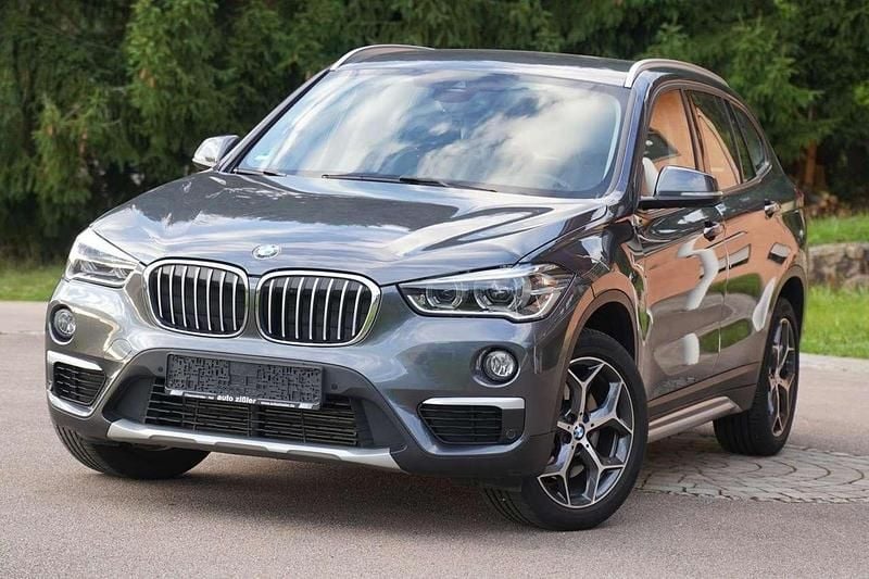 Mineralgrau Gebraucht 2016 BMW X1 xLine SUV | 15.450 € (Superpreis) - Bild 1/4