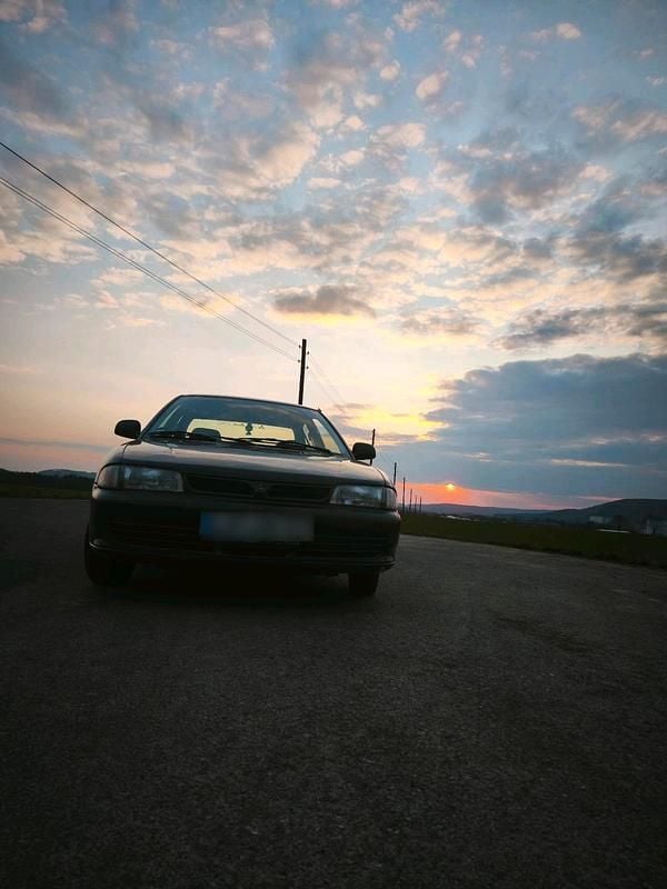 Second-hand Mitsubishi Lancer 75 CP (55 kW) 1995 Negru Berlinǎ