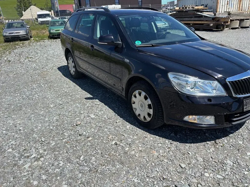 Brugt Skoda Octavia 105 HK (77 kW) 2012 Sort Stationcar