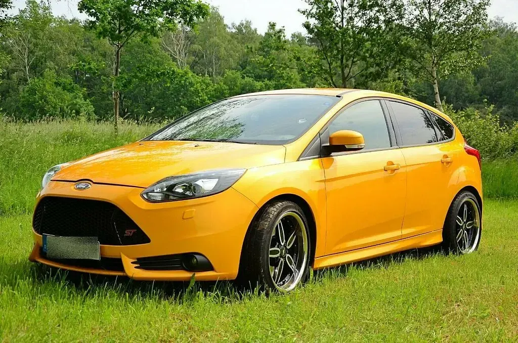 Gebraucht Ford Focus Sport 250 PS (183 kW) 2013 Gelb metallic Limousine