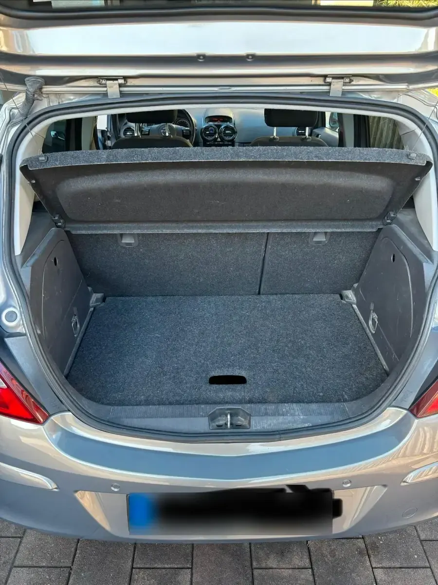 Używany Opel Corsa Edition 89 KM (65 kW) 2010 Brązowy Hatchback
