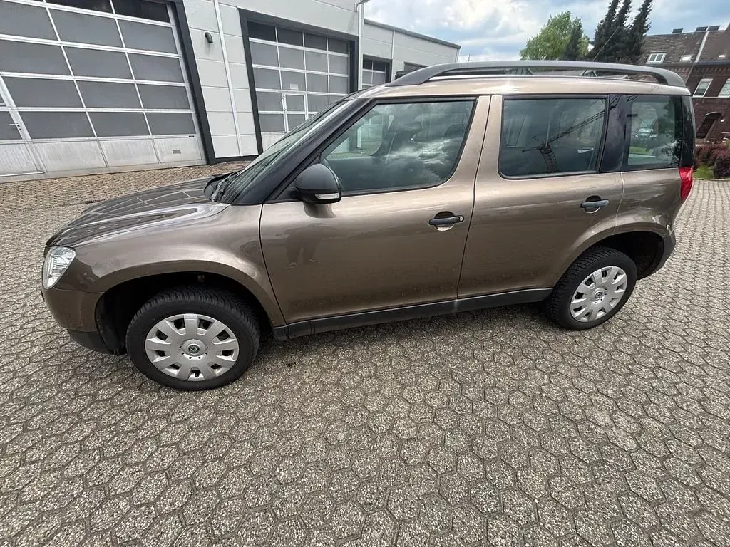 Używany Skoda Yeti 105 KM (77 kW) 2011 Brązowy SUV