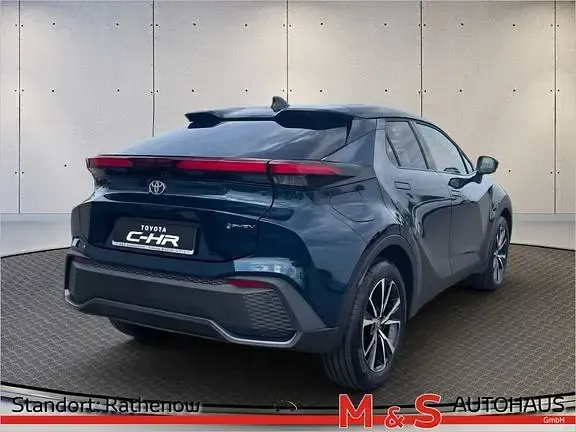 Gebraucht Toyota C-HR Team 140 PS (102 kW) 2024 Dark teal mica metallic / black SUV