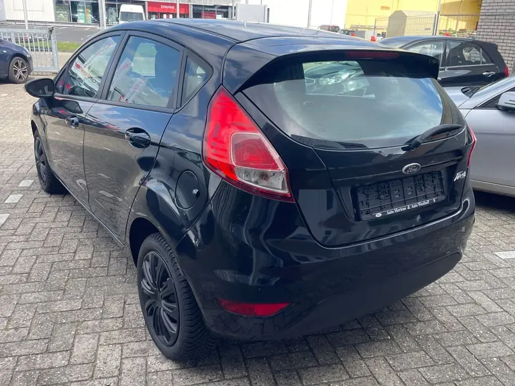 Gebraucht Ford Fiesta Trend 82 PS (60 kW) 2013 Schwarz Limousine