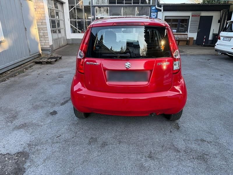 Usado Suzuki Splash Basic 65 HP (47 kW) 2010 Vermelho Citadino