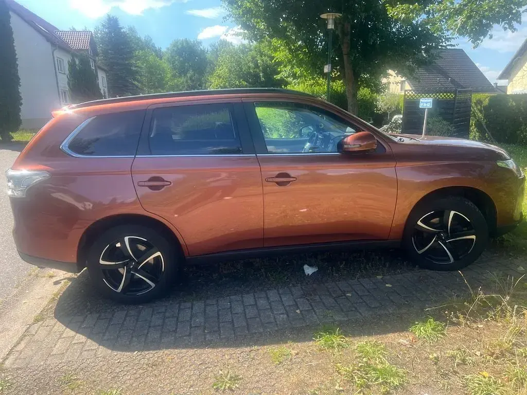 Gebraucht Mitsubishi Outlander 150 PS (110 kW) 2013 Orange SUV
