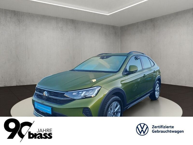 Visual green metallic Gebraucht 2024 VW Taigo Life SUV | 25.800 € (Fairer Preis) - Bild 1/3