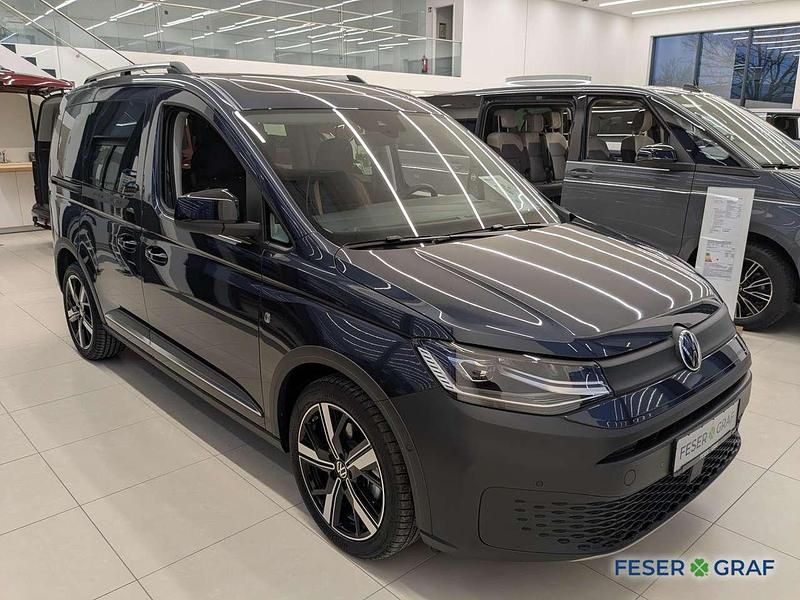 Gebraucht VW Caddy PanAmericana 122 PS (89 kW) 2024 Starlight blue metallic Van / Kleinbus