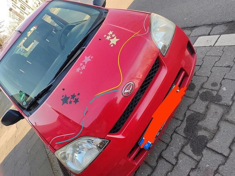 Rot Gebraucht 2005 Daihatsu Cuore Kleinwagen | 450 € (Superpreis) - Bild 1/4