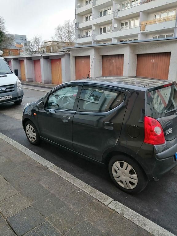 Gebraucht Nissan Pixo Acenta 68 PS (50 kW) 2009 Schwarz Kleinwagen