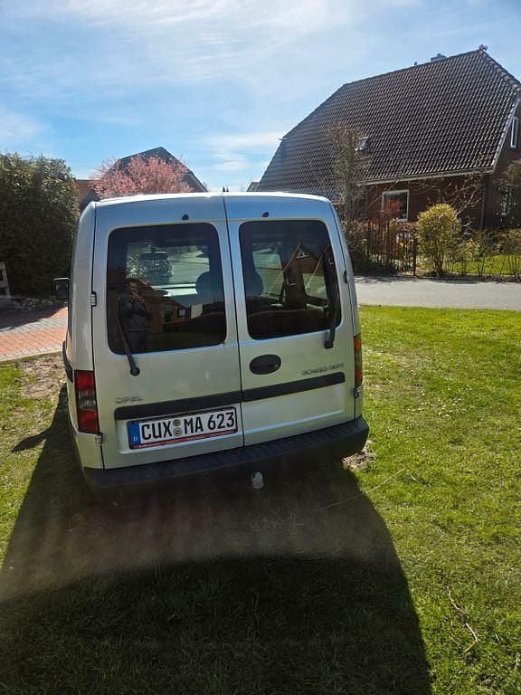 Second-hand Opel Combo Edition 90 CP (66 kW) 2011 Argintiu Monovolum