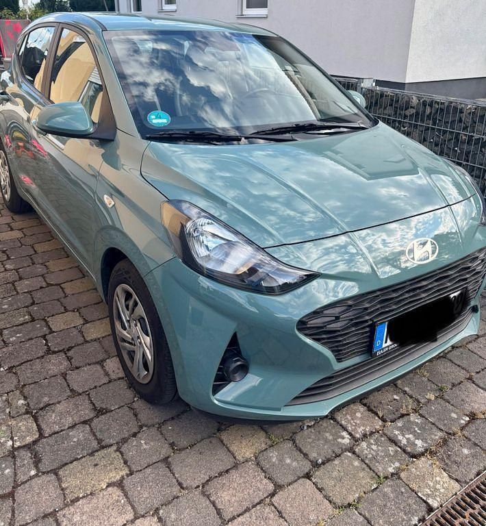 Grün Gebraucht 2024 Hyundai i10 Select Kleinwagen | 12.499 € (Superpreis) - Bild 1/4