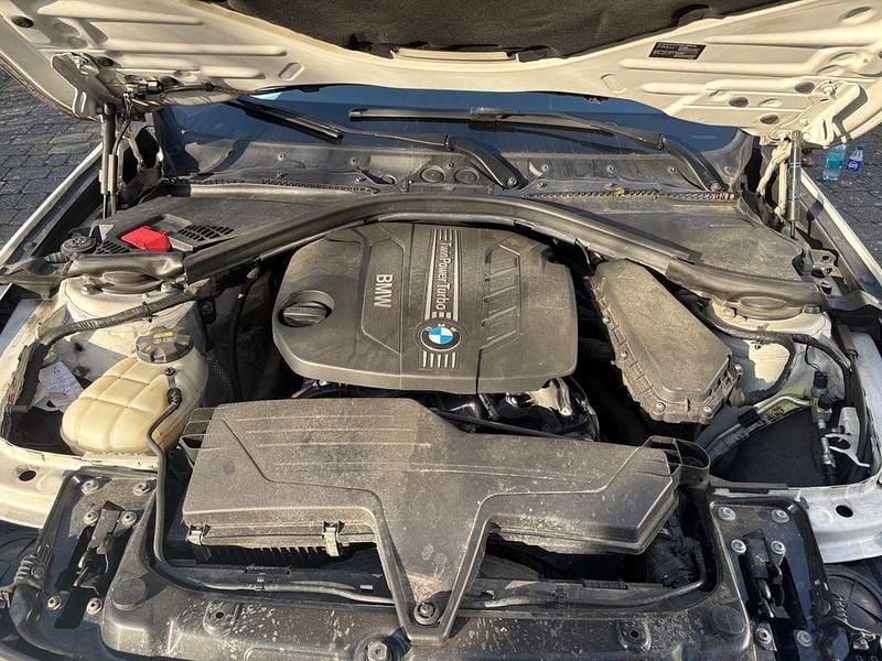 Second-hand BMW 318 143 CP (105 kW) 2014 Negru Break