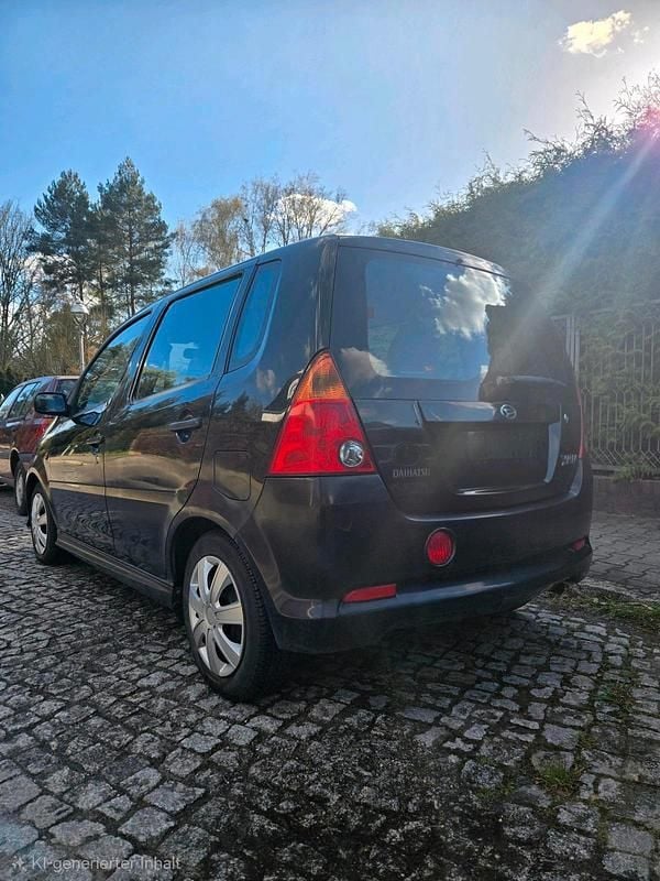 Gebraucht Daihatsu YRV 87 PS (63 kW) 2001 Schwarz Van / Kleinbus