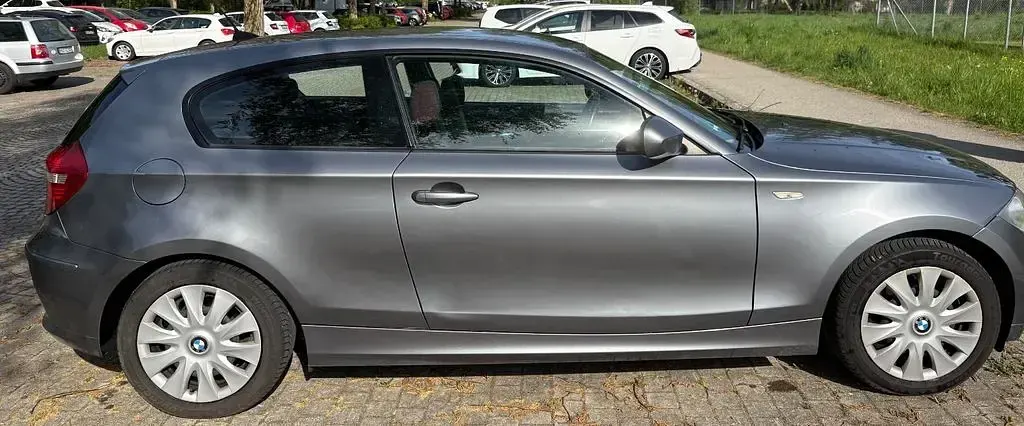 Usata BMW 116 122 CV (89 kW) 2009 Grigio Utilitaria