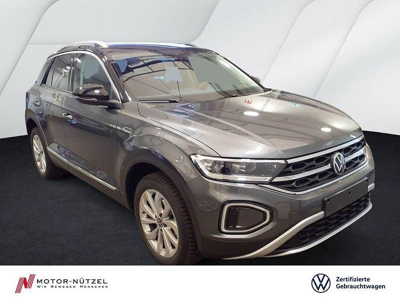 Indiumgrau metallic Gebraucht 2024 VW T-Roc Style SUV | 28.830 € (Guter Preis) - Bild 1/4