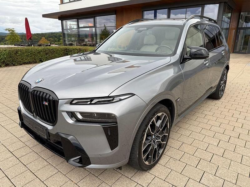 Grau Gebraucht 2023 BMW X7 M Sport SUV | 84.900 € - Bild 1/4