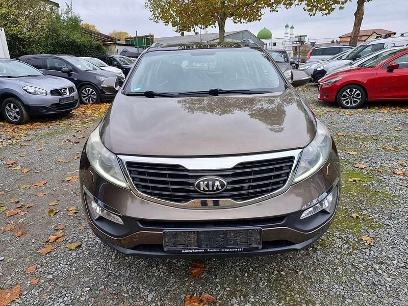 Braun Gebraucht 2013 Kia Sportage Vision SUV | 9.980 € (Guter Preis) - Bild 1/4