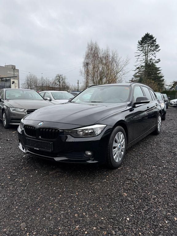 Schwarz Gebraucht 2013 BMW 316 Sport Line Kombi | 5.600 € (Superpreis) - Bild 1/4