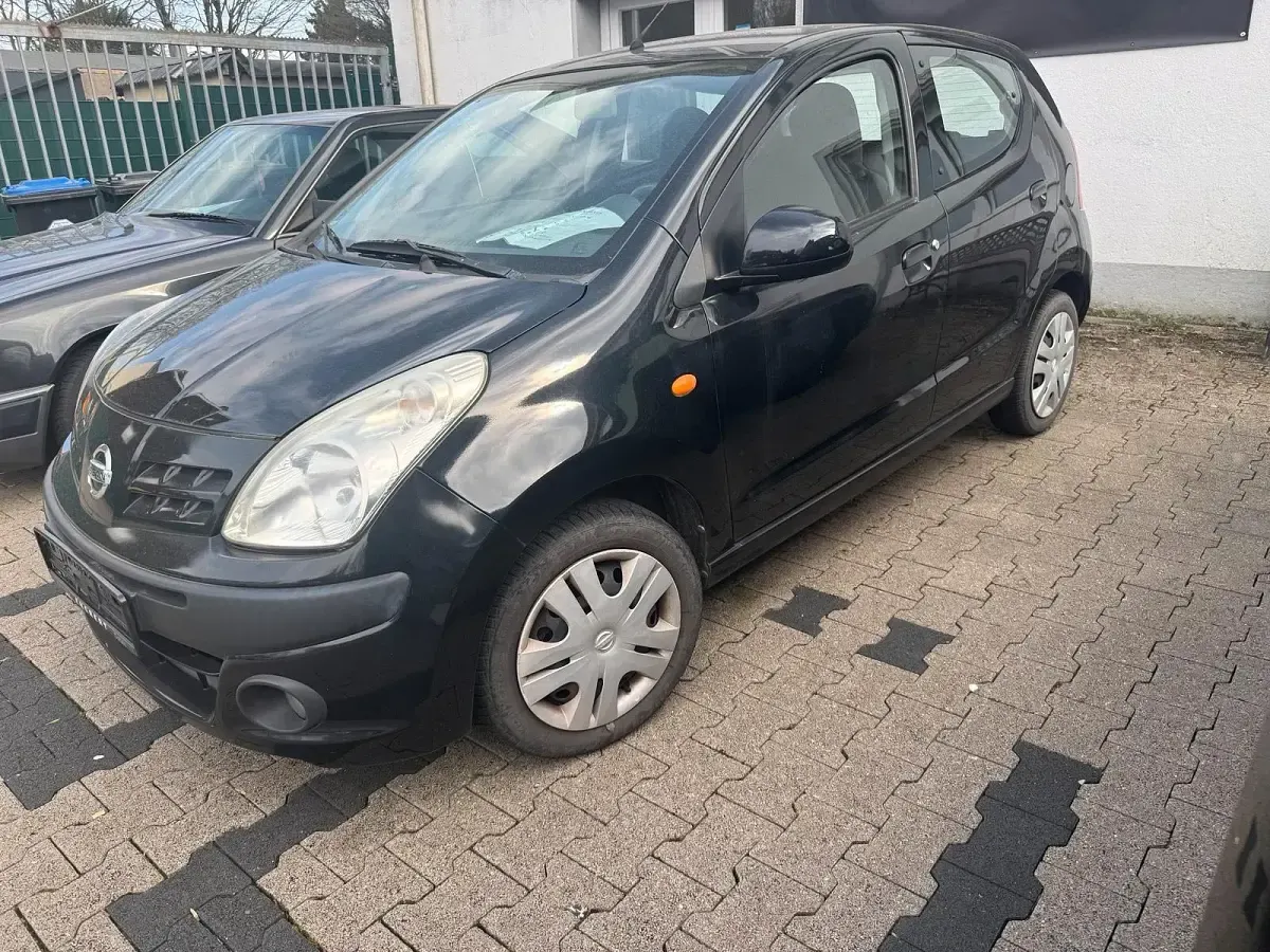 Gebraucht Nissan Pixo 67 PS (49 kW) 2009 Schwarz Kleinwagen