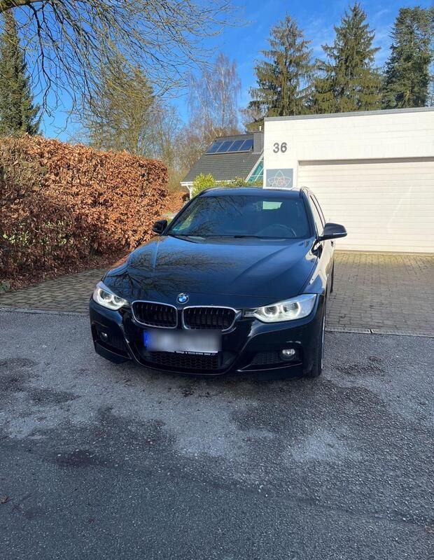 Schwarz Gebraucht 2014 BMW 320 M Sport Kombi | 7.950 € - Bild 1/4