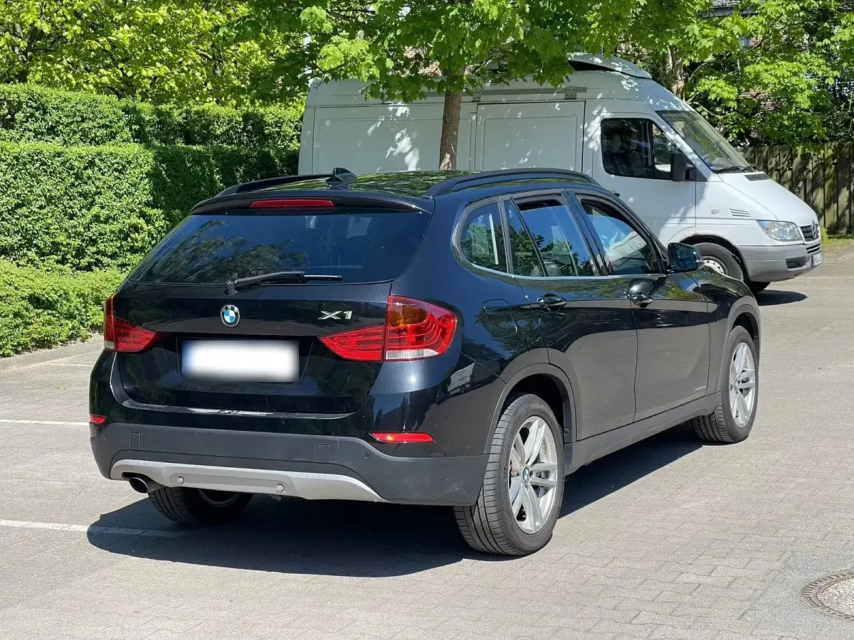 Second-hand BMW X1 143 CP (105 kW) 2014 Negru SUV