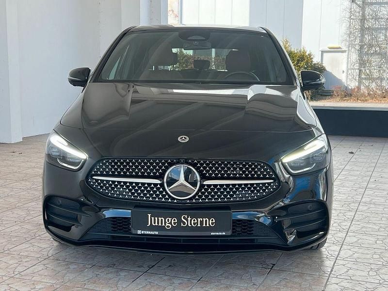 Gebraucht Mercedes B250e AMG line 218 PS (160 kW) 2024 Metalliclack kosmosschwarz Van / Kleinbus