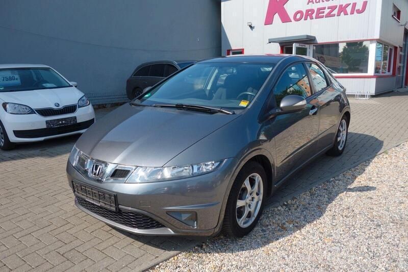 Grau Gebraucht 2009 Honda Civic Comfort Limousine | 4.489 € (Fairer Preis) - Bild 1/4