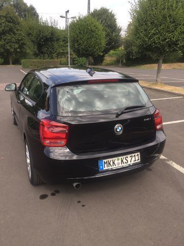 Gebraucht BMW 114 102 PS (75 kW) 2014 Schwarz metallic Kleinwagen