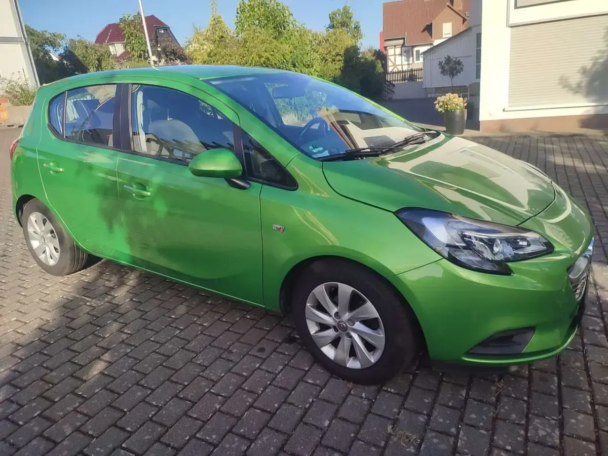 Gebraucht Opel Corsa Edition 90 PS (66 kW) 2015 Grün Kleinwagen