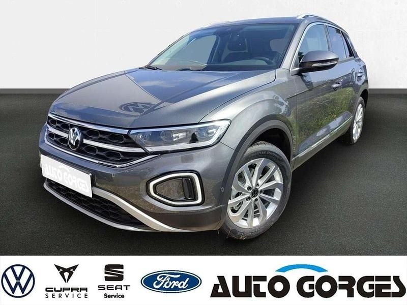 Grau (indiumgrau metallic) Gebraucht 2024 VW T-Roc Style SUV | 33.475 € (Etwas zu teuer) - Bild 1/4