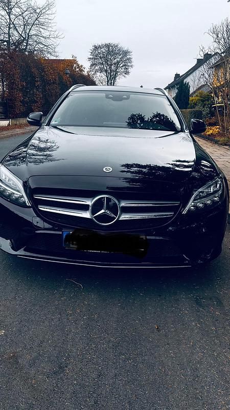 Schwarz Gebraucht 2021 Mercedes C300e Kombi | 19.500 € - Bild 1/4