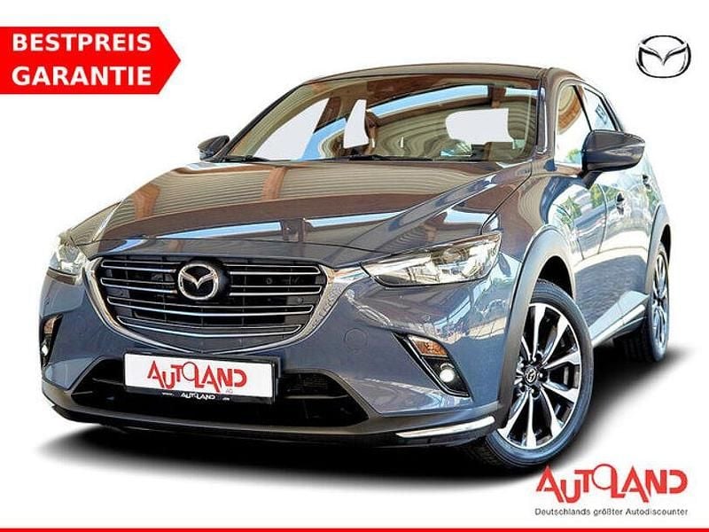 Grau Gebraucht 2021 Mazda CX-3 Selection SUV | 21.990 € (Etwas zu teuer) - Bild 1/4