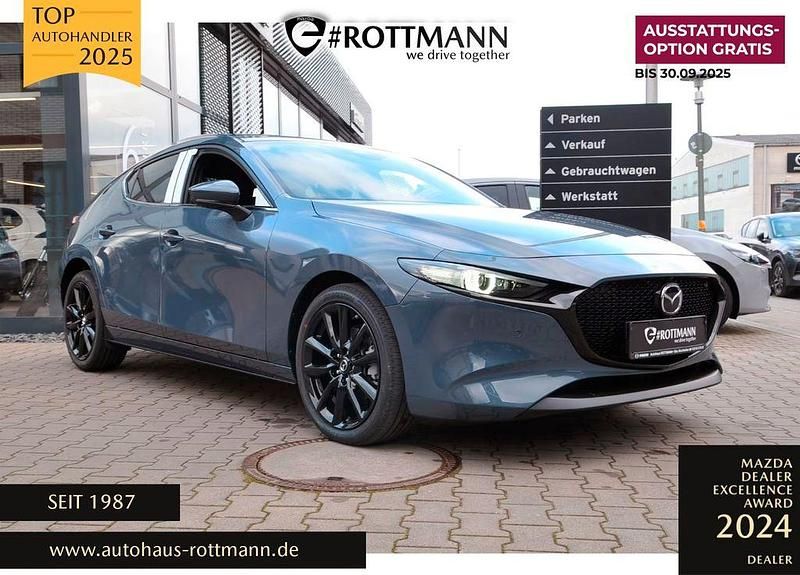Grau Gebraucht 2024 Mazda 3 Exclusive-Line Kleinwagen | 30.470 € (Fairer Preis) - Bild 1/4