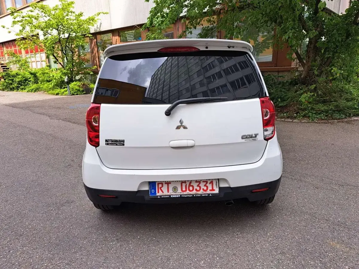 Gebraucht Mitsubishi Colt Motion 75 PS (55 kW) 2012 Porcelain white Kleinwagen
