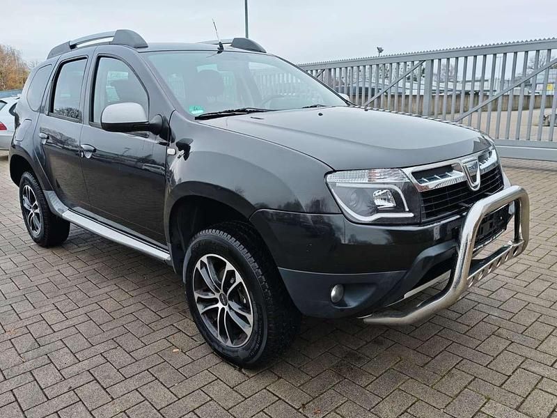 Perlmuttschwarz Gebraucht 2012 Dacia Duster Lauréate SUV | 6.499 € (Fairer Preis) - Bild 1/4
