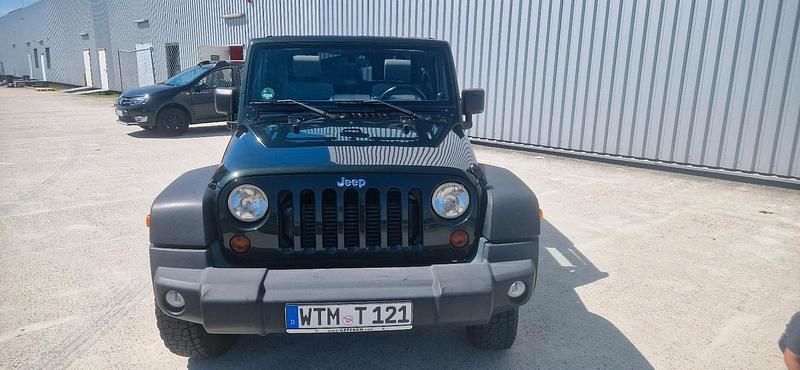 Grün Gebraucht 2010 Jeep Wrangler Unlimited Sport SUV | 17.990 € (Superpreis) - Bild 1/4