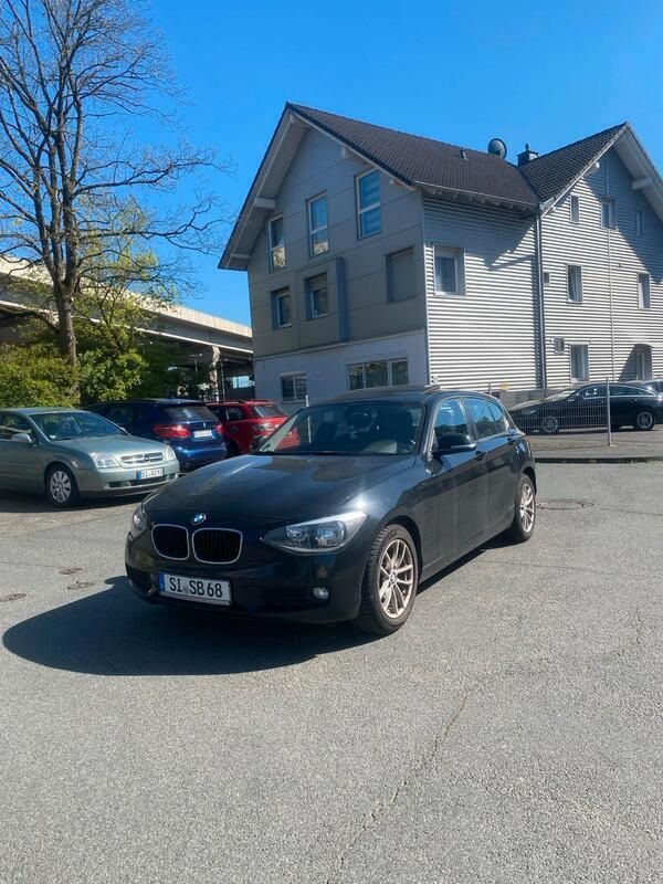 Schwarz Gebraucht 2011 BMW 116 Kleinwagen | 4.900 € (Fairer Preis) - Bild 1/4