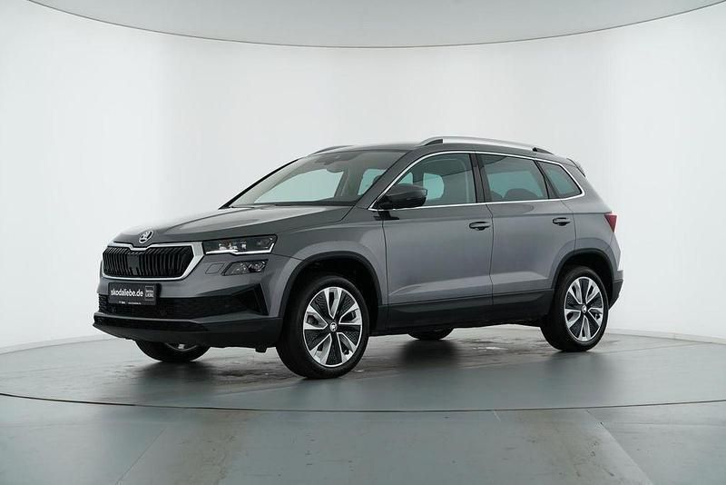 Graphitegrau metallic Gebraucht 2024 Skoda Karoq Style SUV | 29.889 € (Guter Preis) - Bild 1/4