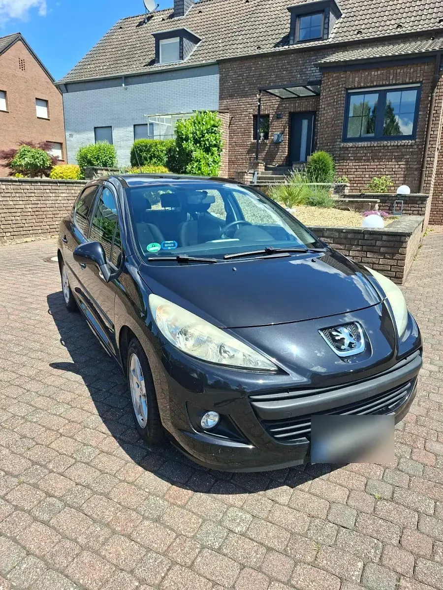 Gebraucht Peugeot 207 95 PS (69 kW) 2010 Schwarz Kleinwagen
