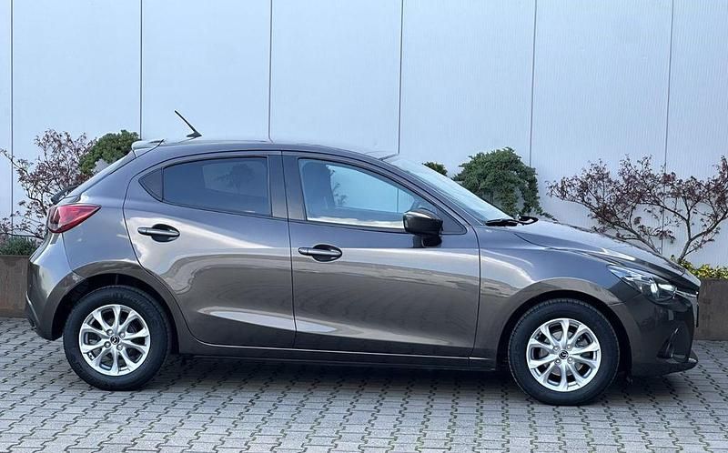 Gebraucht Mazda 2 Exclusive-Line 90 PS (66 kW) 2015 Braun Limousine