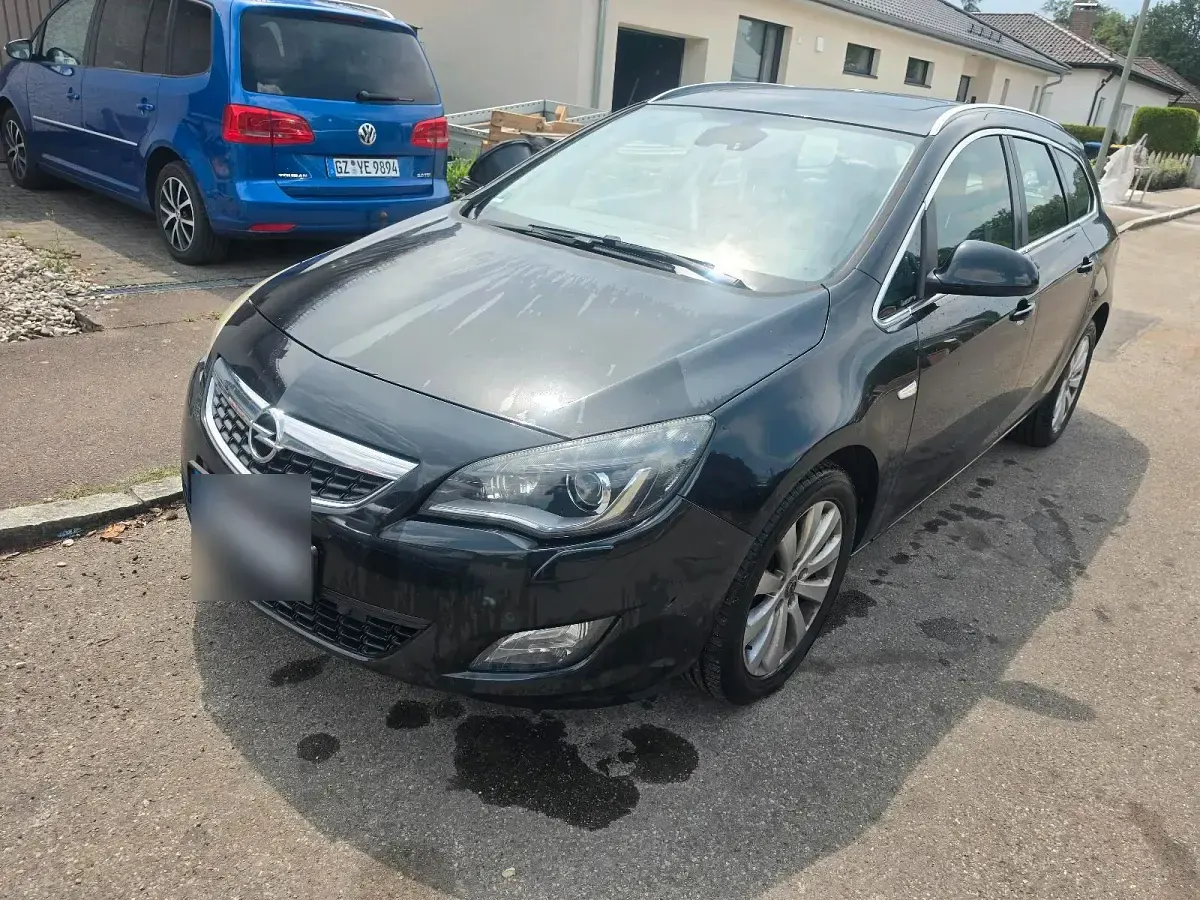 Gebraucht Opel Astra 165 PS (121 kW) 2011 Schwarz Kombi