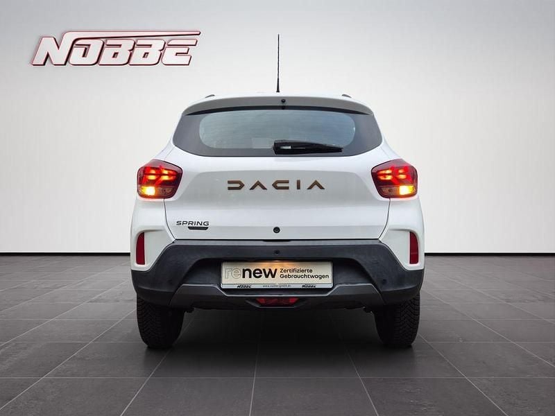 Gebraucht Dacia Spring Extreme 47 kW (65 PS) 2023 Kaolinweiss Kleinwagen
