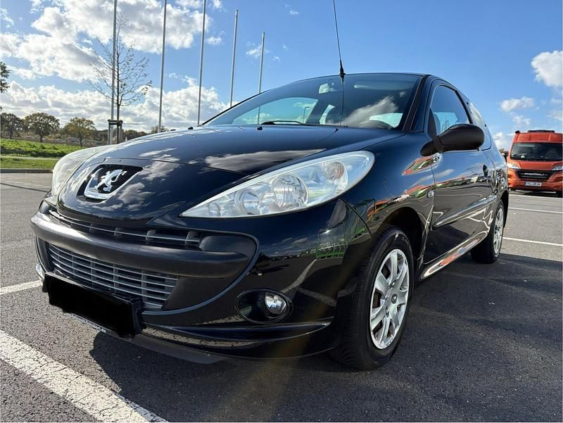 Schwarz Gebraucht 2011 Peugeot 206+ Kleinwagen | 2.499 € - Bild 1/4