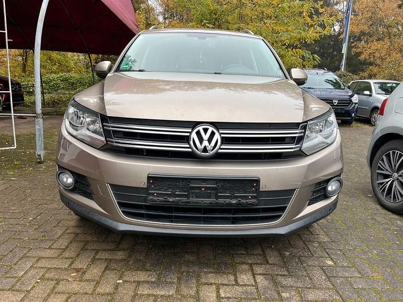 Beige Gebraucht 2014 VW Tiguan Sportline SUV | 14.449 € (Guter Preis) - Bild 1/4