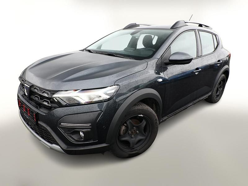 Kometengrau metallic Gebraucht 2022 Dacia Sandero Comfort | 14.626 € (Fairer Preis) - Bild 1/4